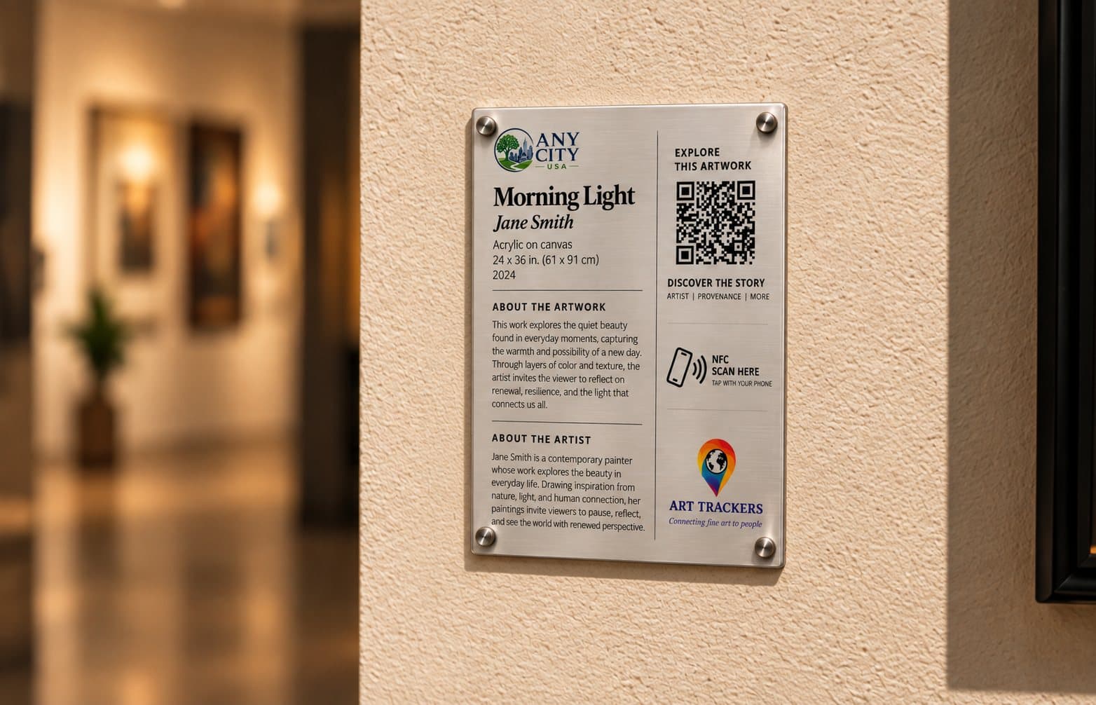 A Morning Light wall plaque with a QR code mounted beside a painting